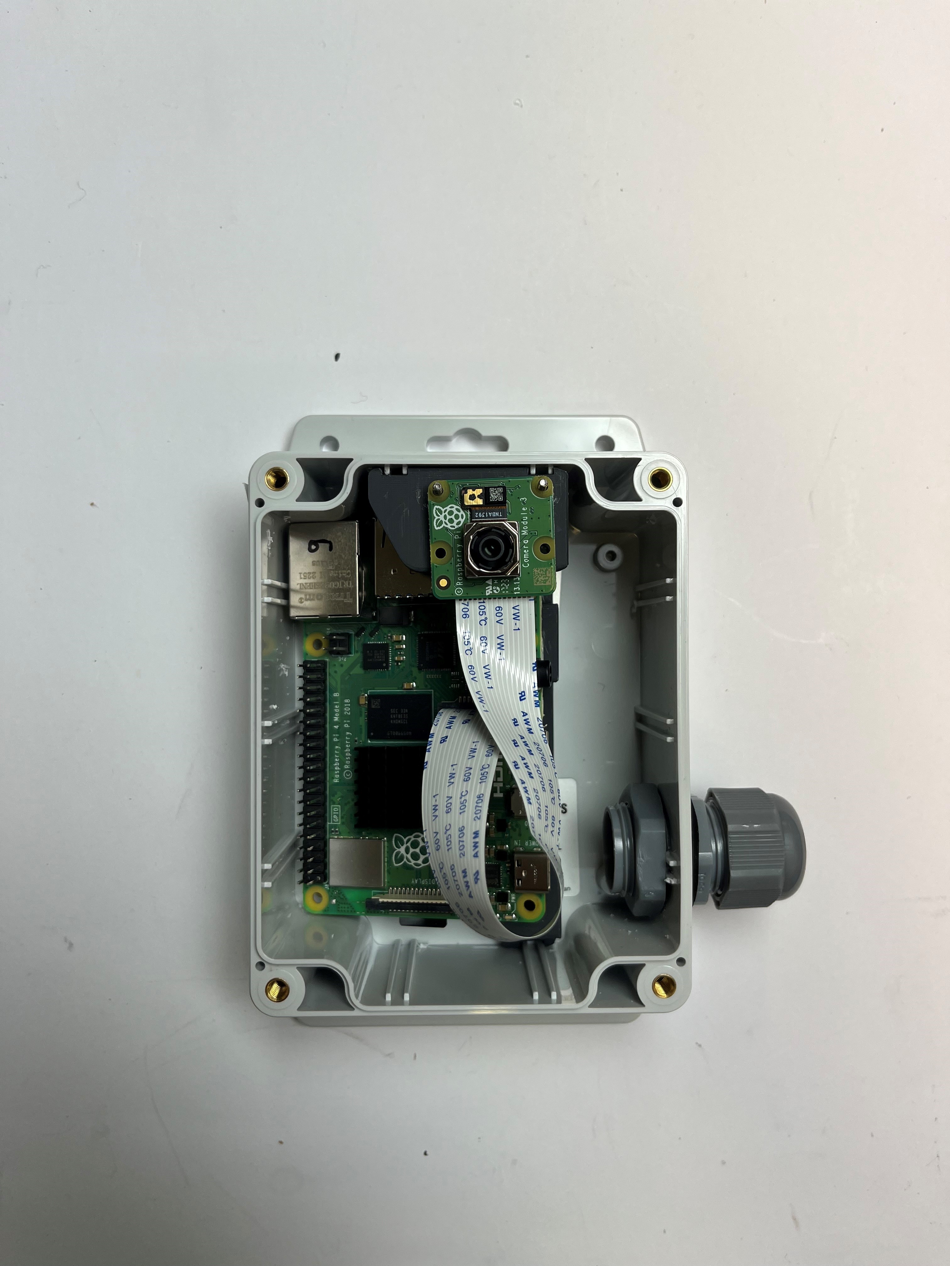 Caméra et support dans le boitier